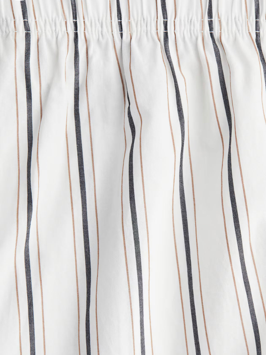 Women’s Ankle-Length Cotton Pants by H&M.