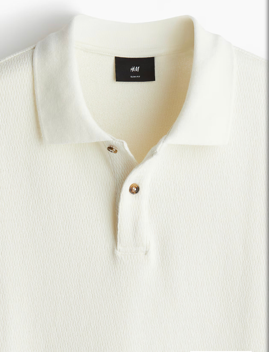 Men’s Slim Fit Polo Shirt by H&M.