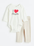 Baby 2-Piece Body Suit and Pants by H&M— Size 0-2 Months.